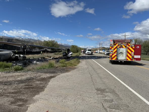 A train vs. tanker truck collision at a railroad crossing just east of Rifle.