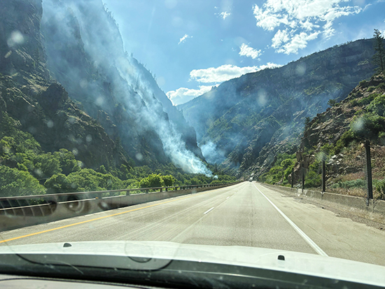 A brush fire burns in Glenwood Canyon.