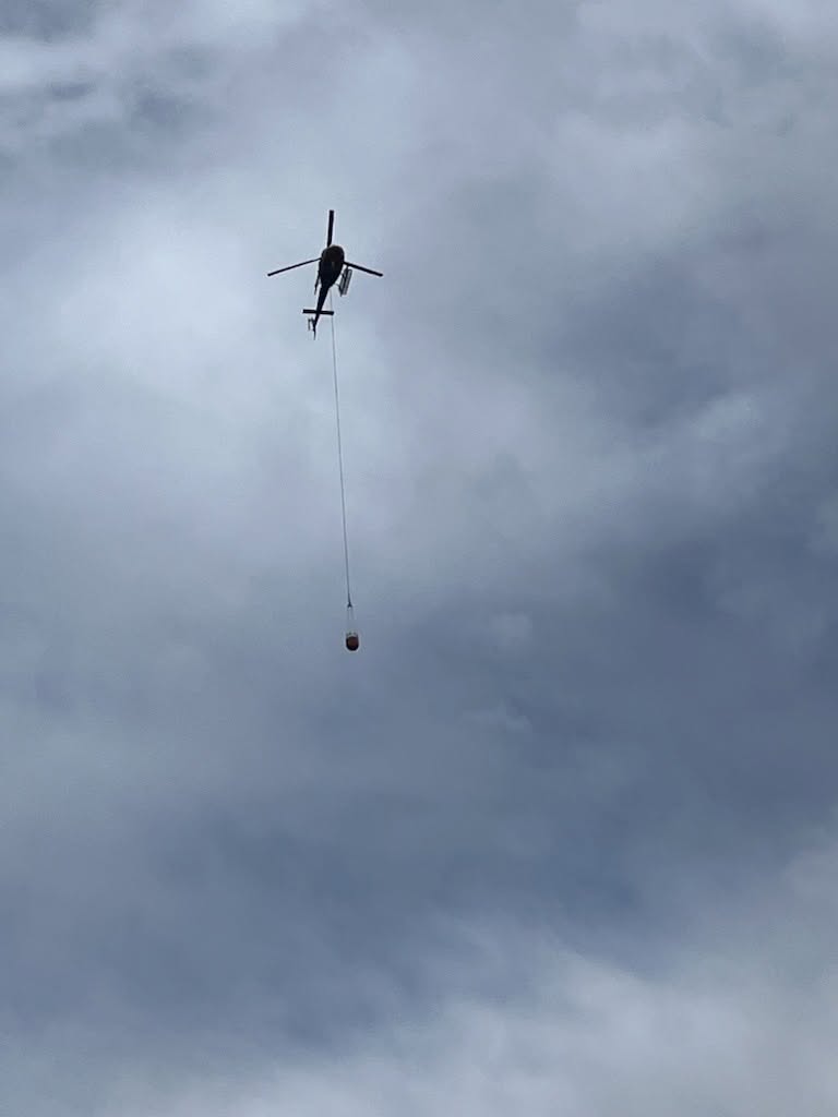 Paradise Fire helicopter with bucket