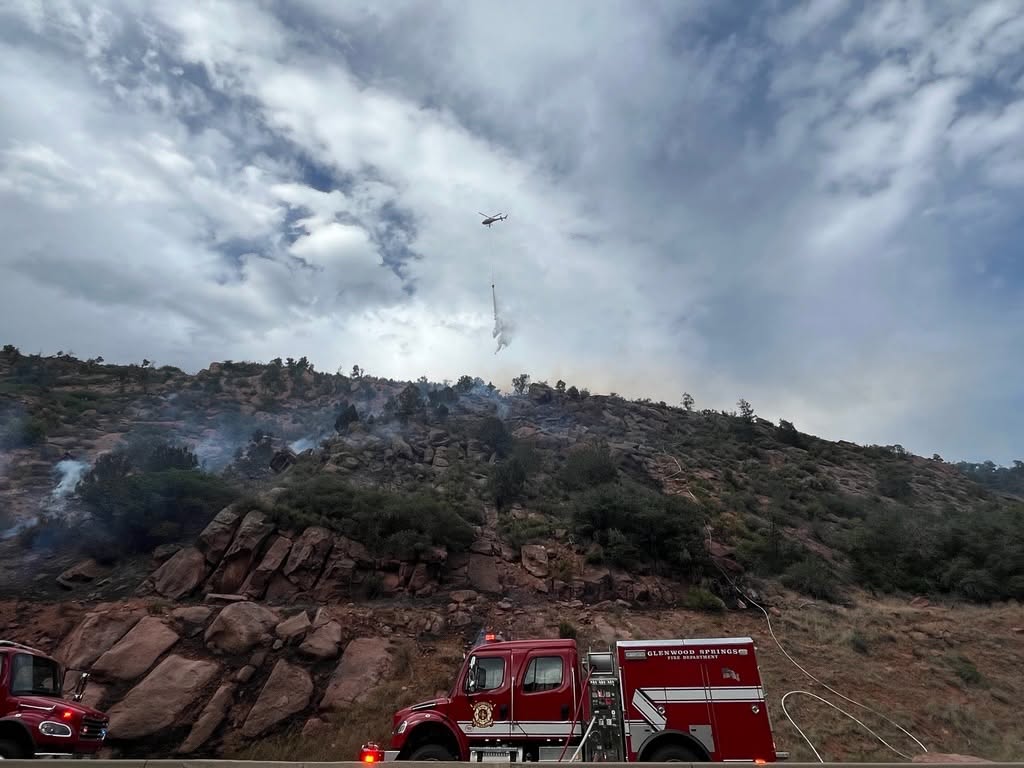 Truck and fire operations on hillside in South Canyon