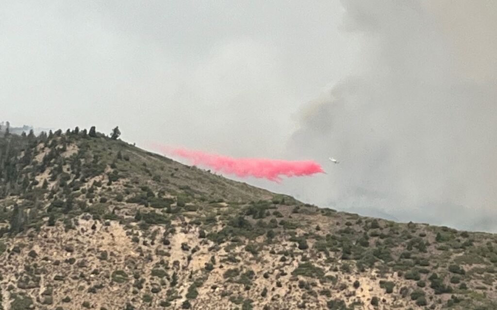 8-25-25 Plane drops retardant on Derby Fire
