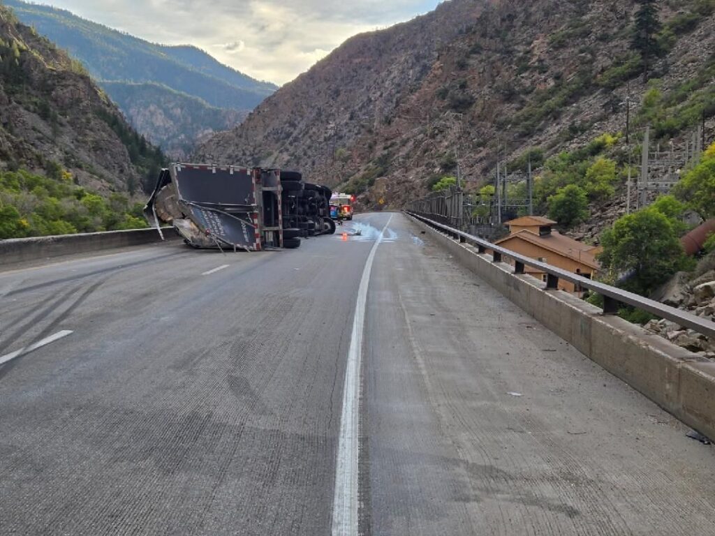 Commercial vehicle on side on I-70