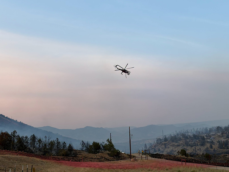Aerial emergency services respond to the dry creek fire