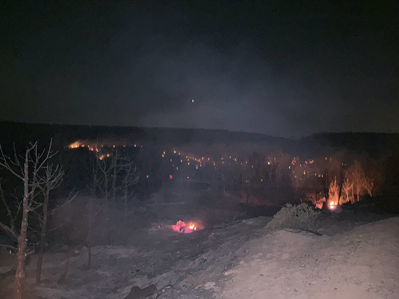 Emergency services respond to the dry creek fire at night