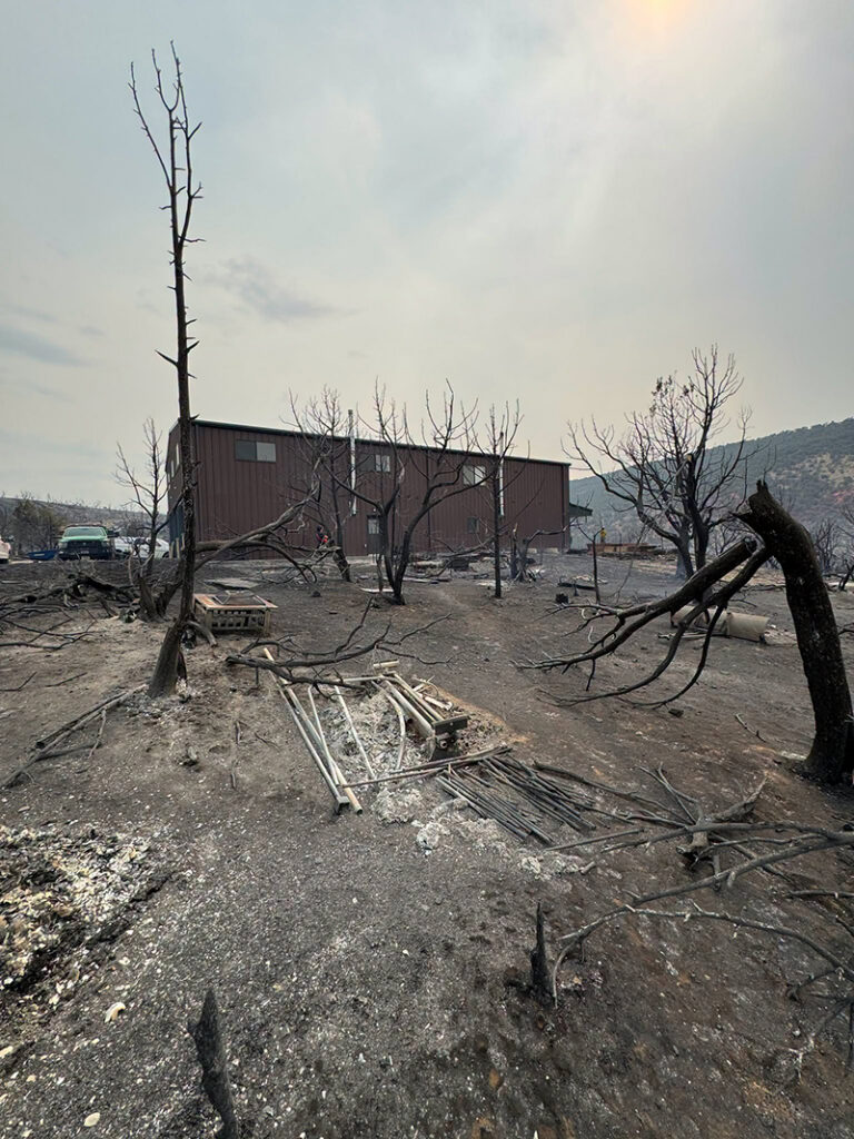Emergency services respond to the Dry Creek Fire by natural gas facilities.
