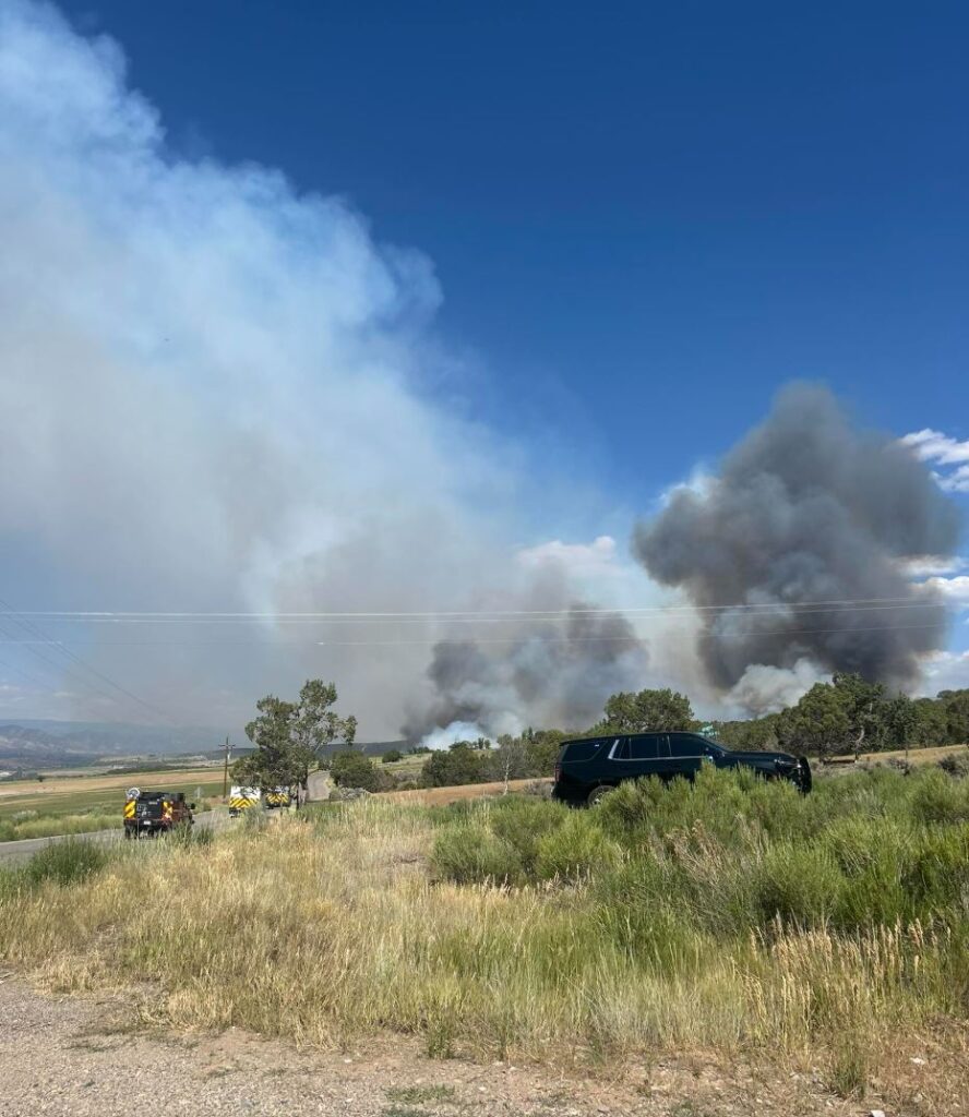 A brush fire near County Roads 320 and 309, near Rifle, CO.